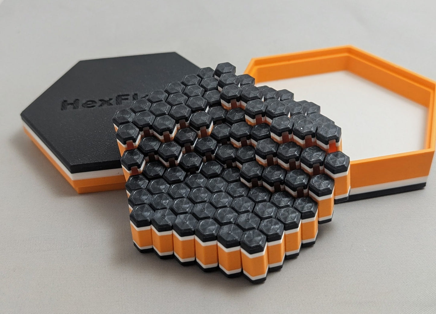 HexFlow - Black/White/Orange